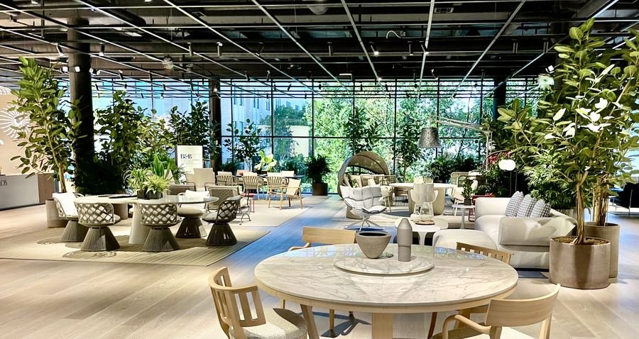 Light-filled commercial dining space with interior trees