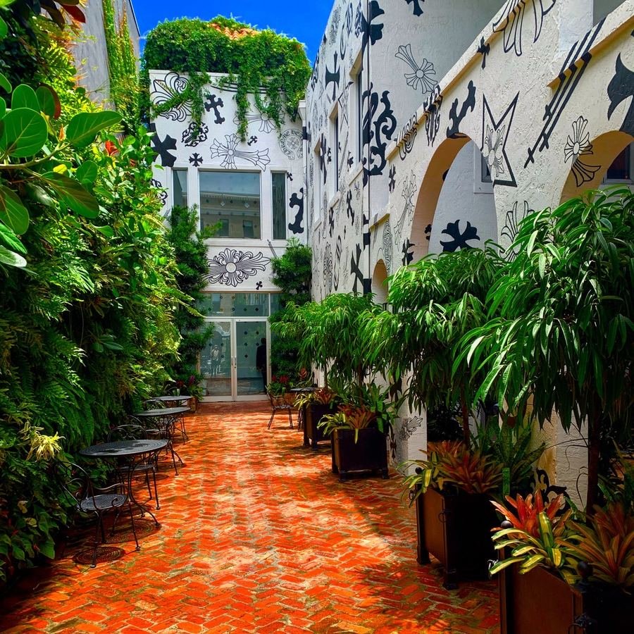 Miami courtyard garden framed by murals